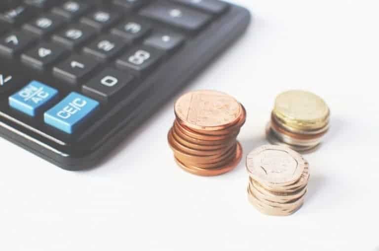 Piles Of Coins And Calculator