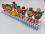 חנוכייה עבודת יד ריקוד סביבונים  – לנרות רגילים